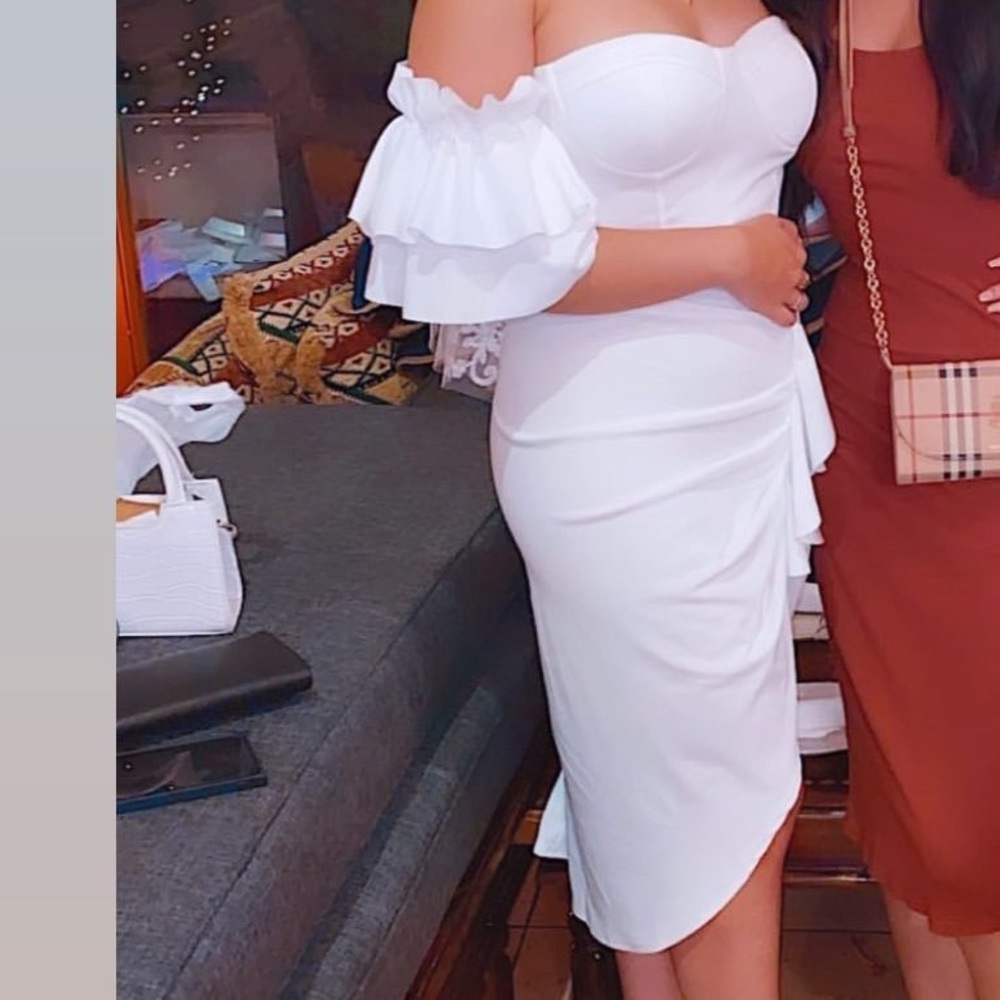 White dress off the shoulder with ruffles